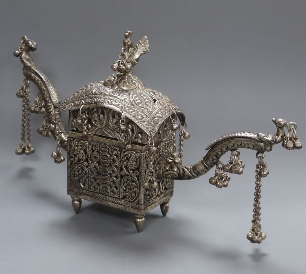 A Thai? white metal two handled pot pourri? box, hung with numerous bells, length 25cm, 10oz.